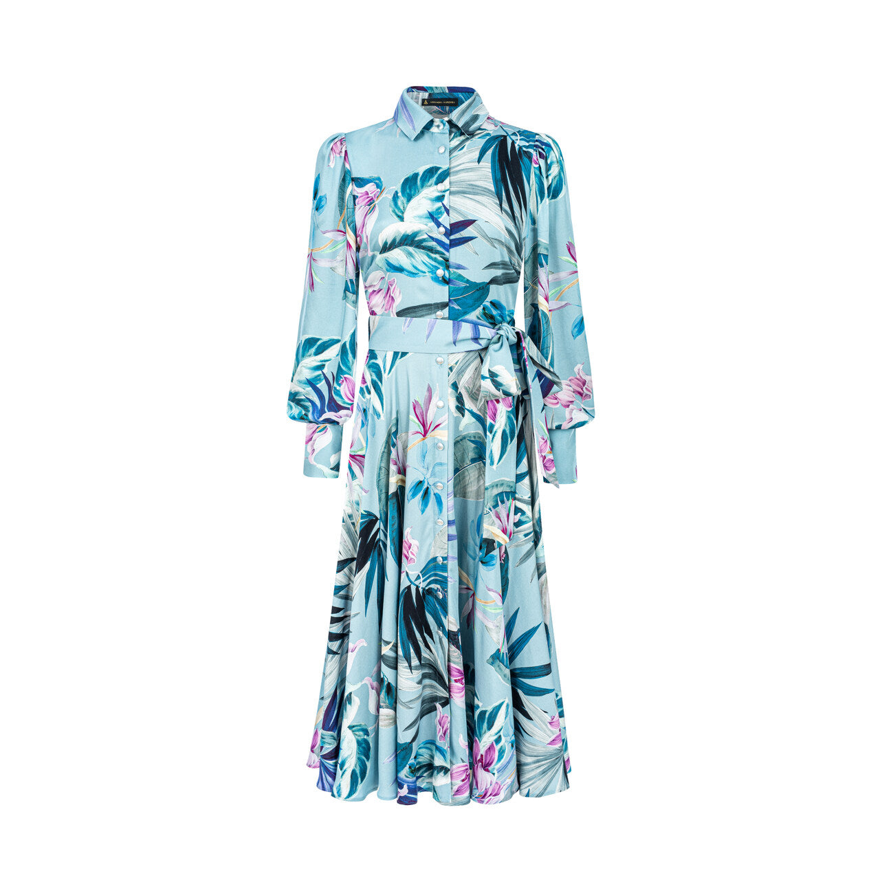 Aleksandra Markowska i sukienka z tropikalnym, liściastym printem – turkusowa podstawa i kobiecy, kwiatowy wzór.